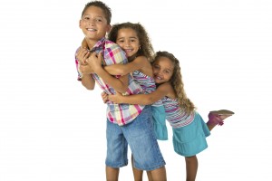 Image_three siblings hugging